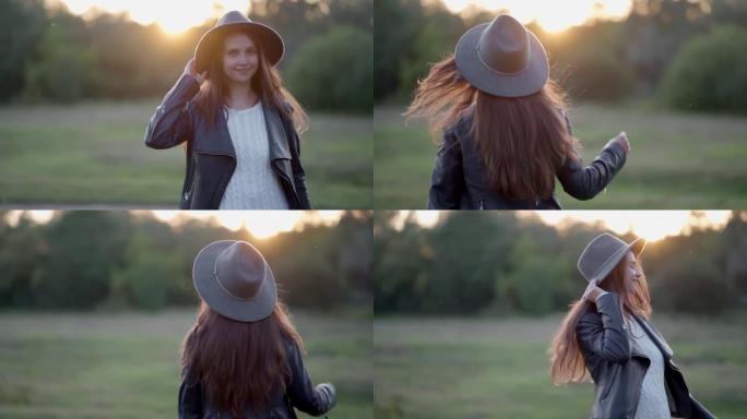 离开后，女孩转身在日落光线下调整帽子