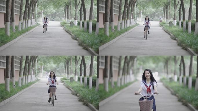 年轻的亚洲妇女骑自行车上学