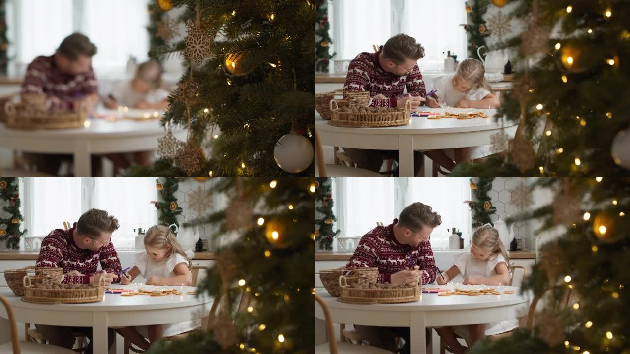可爱的小女孩和爸爸给圣诞老人写信。用8k的红氦相机拍摄
