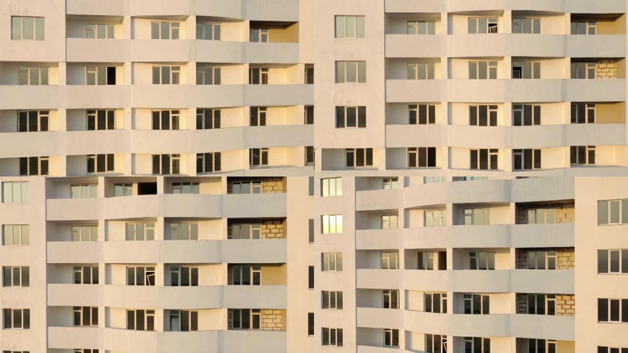 在建住宅公寓楼立面鸟瞰图。带窗户和阳台的高层建筑。建筑业。城市化