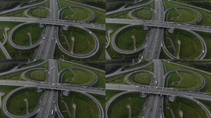 鸟瞰图的多层高速公路，带有行驶中的汽车，从鸟瞰图看蝴蝶回旋处