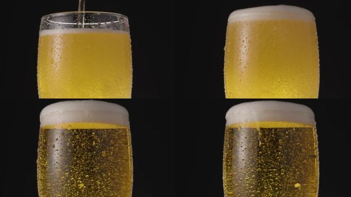 黑色背景上的一杯淡啤酒。喷射流缓慢地将啤酒装满玻璃杯，从而产生大量气泡和泡沫。顺时针旋转。