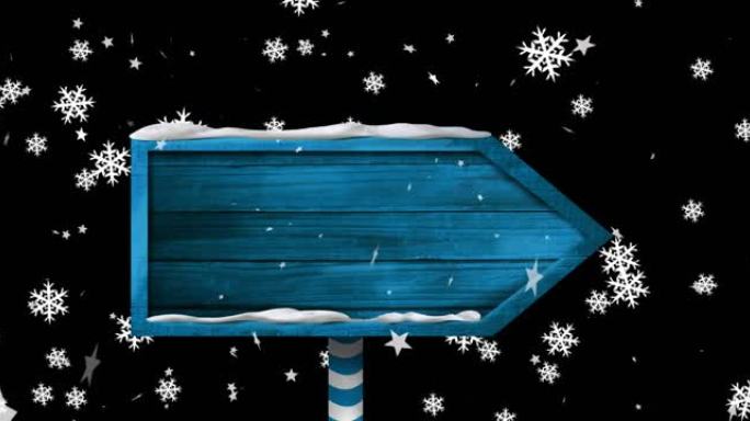黑色背景上的圣诞节雪花落在木制标志上的动画