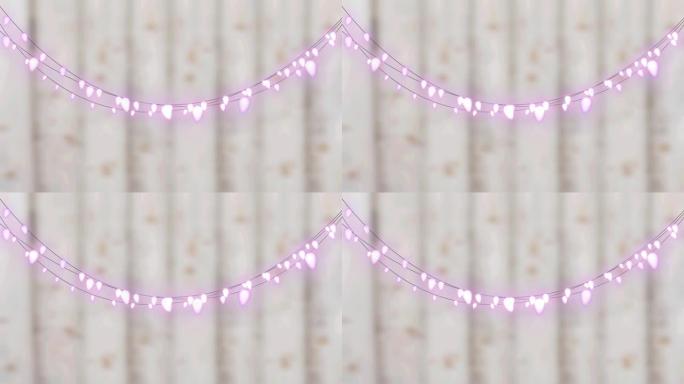木制背景下悬挂的粉色装饰仙女灯的数字动画