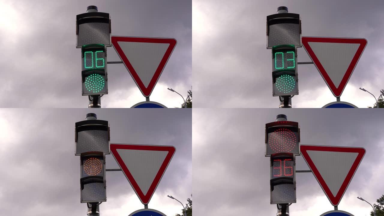 城市十字路口的交通信号灯和路标，可倒计时几秒钟以发出信号更改