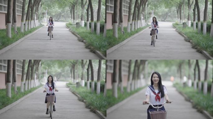 年轻的亚洲妇女骑自行车上学