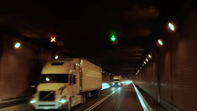 汽车或卡车乘坐槽隧道暖黄光慢动作的视点