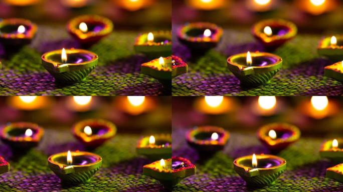 紫色到绿色编织表面发光的排灯节蜡烛视频