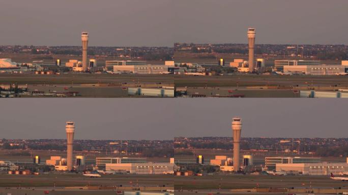 卡尔加里国际机场控制塔，下午有移动的飞机，鸟儿飞来飞去。