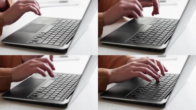 键盘打字博客作家女性手笔记本电脑