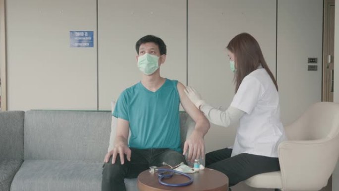 东南亚男子服用新型冠状病毒肺炎疫苗