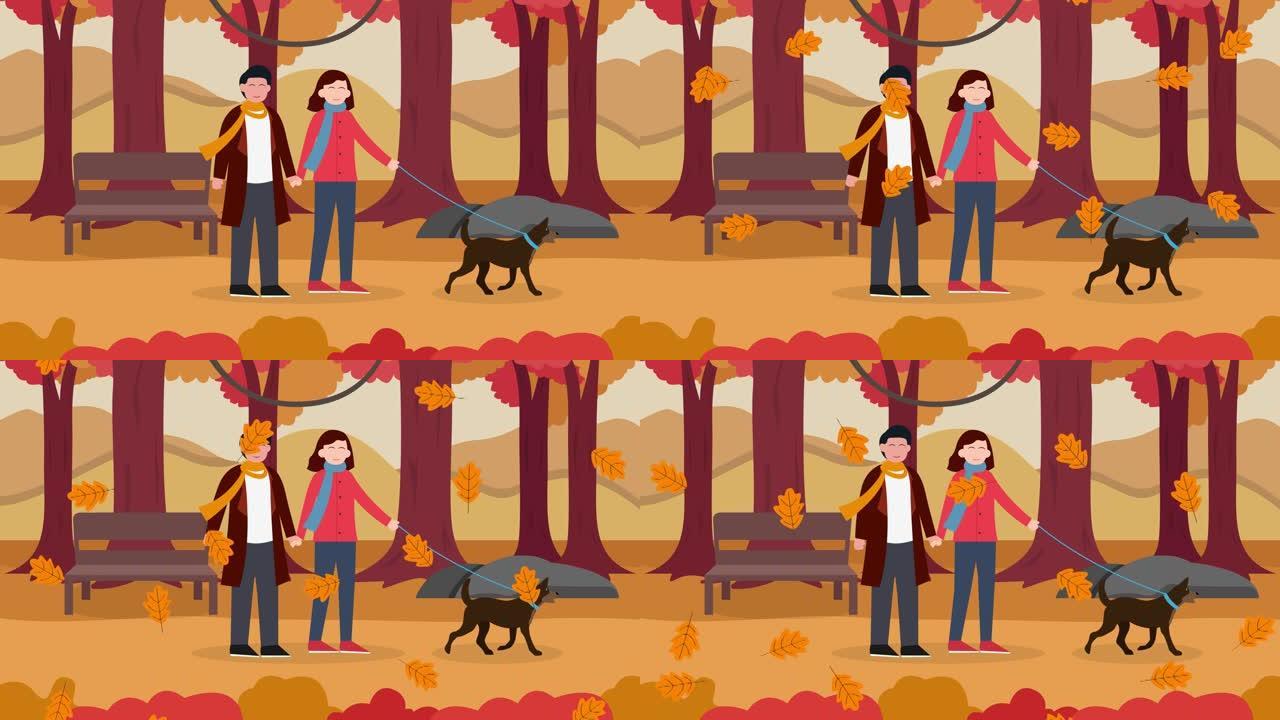 幸福的夫妇在落叶下与狗一起散步