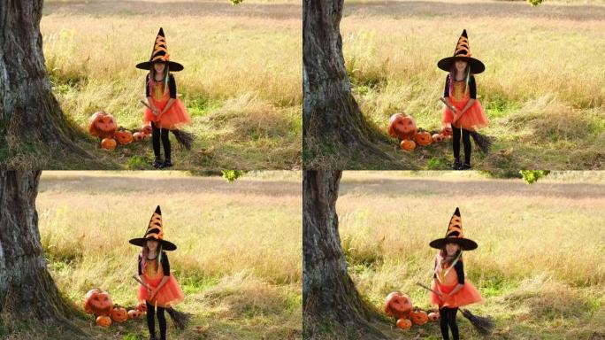 一个穿着女巫服装，戴着一顶大帽子骑在扫帚上的女孩正试图起飞