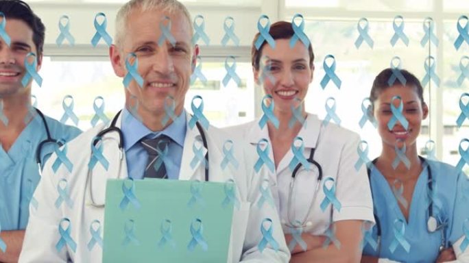 蓝色癌症丝带的动画在微笑的不同团队的女性和男性医生
