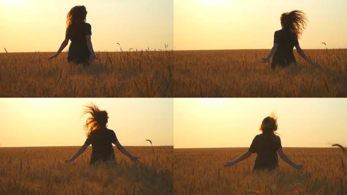 女人在日落时分跑到田野的阳光明媚的地平线上。年轻的高加索女孩夏天在户外玩得开心。晴天和光线。后面的女
