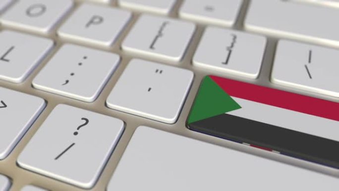 电脑键盘上带有苏丹国旗的键切换到带有英国国旗的键，翻译或搬迁相关动画