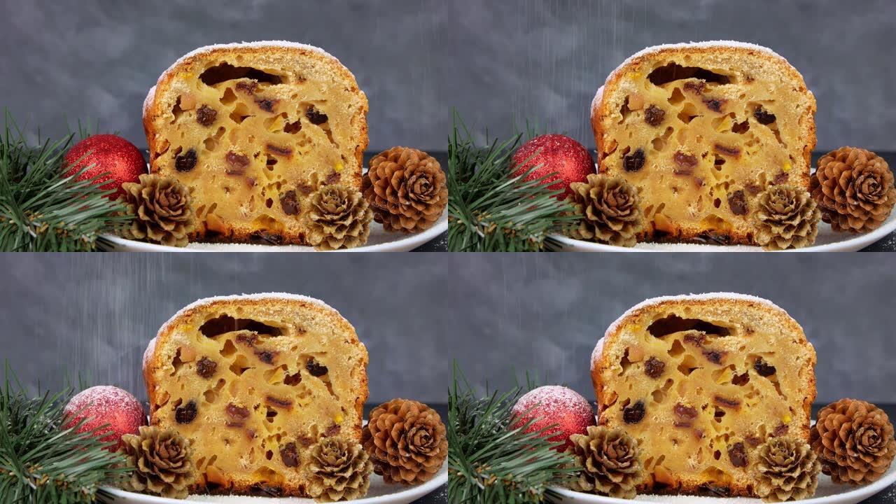 糖粉倒在深色背景的圣诞水果蛋糕上。节日糕点烘焙。斯托伦面团配方配料坚果香料干蜜饯鸡蛋全麦面粉干水果黄