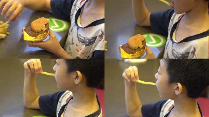关闭中国孩子吃炸薯条和汉堡包