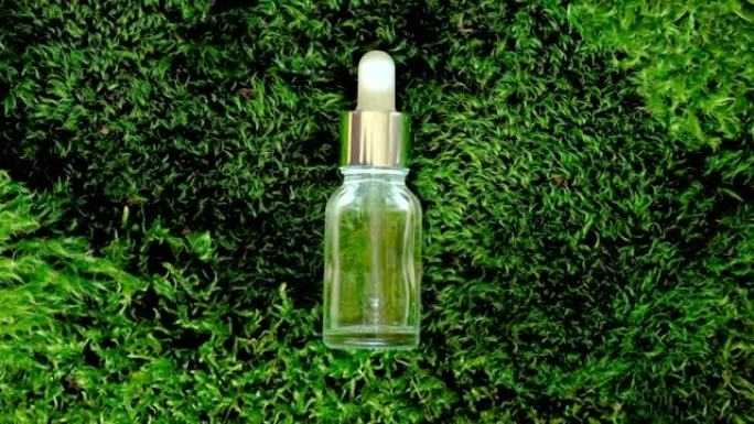 苔藓瓶子里的化妆品。天然化妆品。绿色。