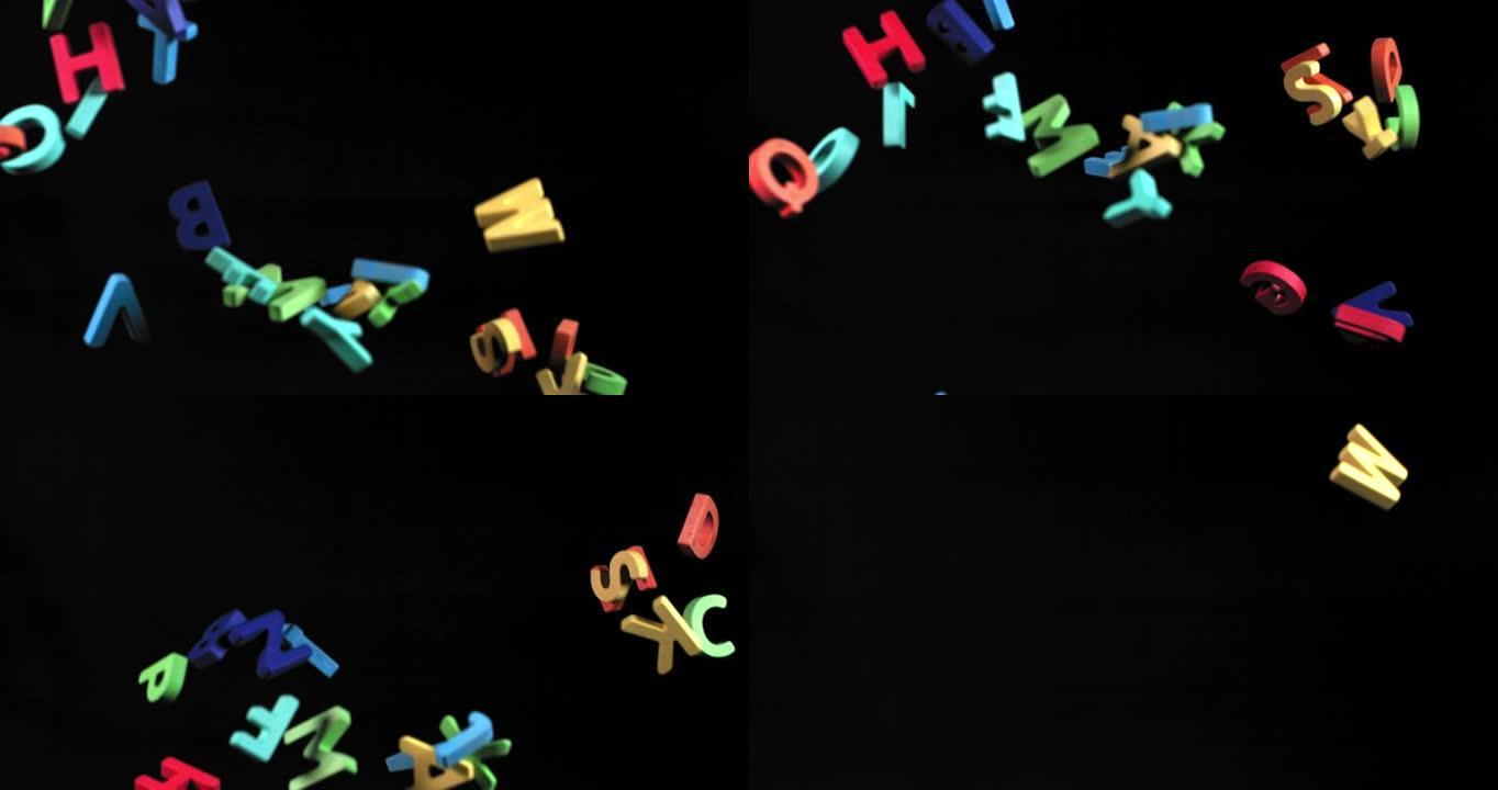 拉丁字母的彩色字母在慢动作中上下飞舞