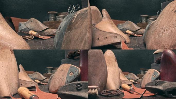 带工具、皮革和表带的补鞋匠车间。老式鞋匠车间。