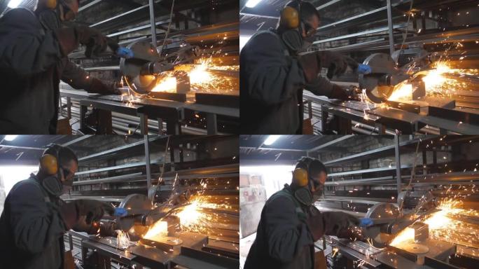 车间里用圆锯锯钢的工匠。人用锯切割机切割金属。工业专业工人在安全防护磨损磨削金属。火花从铁水中飞出。