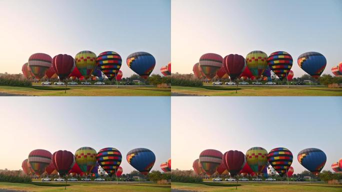 丰富多彩的热气球准备在Singha公园举行的年度音乐节上飞行