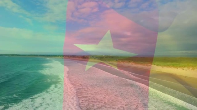 数字组成的挥舞喀麦隆旗反对海滩和海浪的鸟瞰图