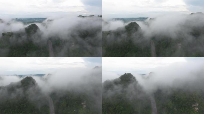带着雾气飞越局部山脉。航拍视频