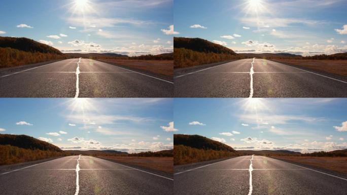 在阳光下沿着一条空旷的沙漠公路拍摄的景色。拍摄om BMPCC 6K Sigma 18-35 1.8