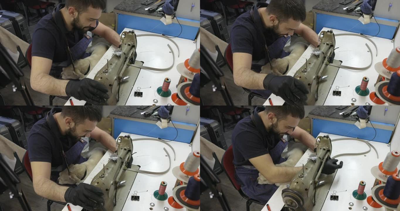 经营小企业的年轻人为机器上的缝纫准备皮带