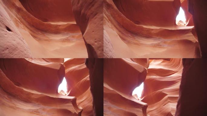奇妙的红色橙色光滑弯曲的砂岩墙在槽羚羊峡谷