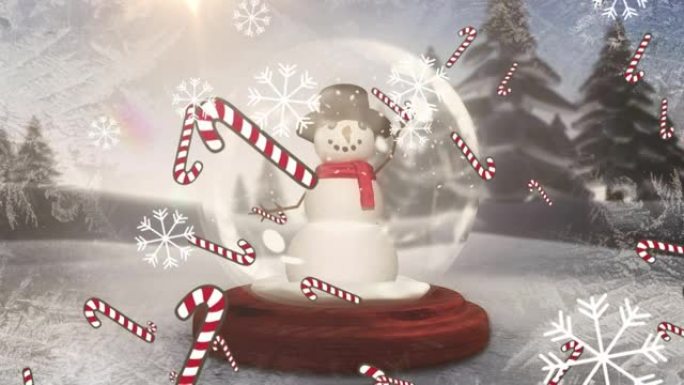糖果手杖图标和雪花落在冬季风景的雪球上的雪人身上