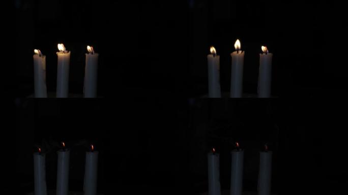 黑暗中的烛火，精神和圣诞节概念