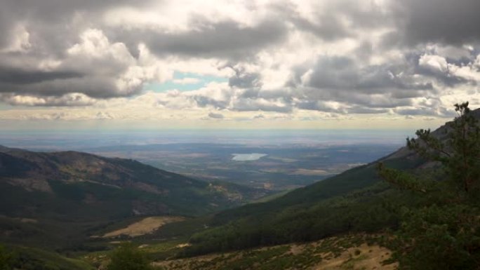远处青山与湖泊之间的一个大山谷的鸟瞰图。