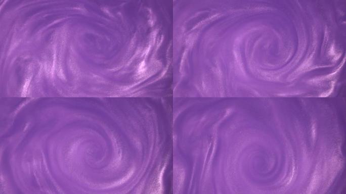紫色闪光抽象背景。闪亮的液态紫色油漆缓慢流到表面。假期，新年，时尚，抽象艺术概念视频