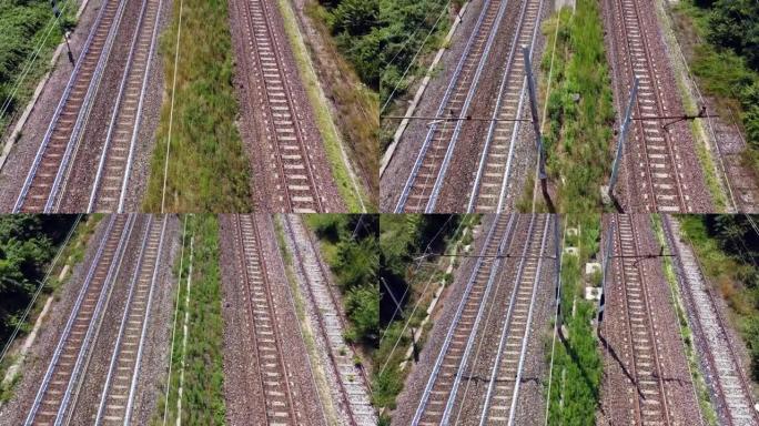 火车铁轨的无人机鸟瞰图-意大利米兰前进铁路的俯视图-旅程的开始