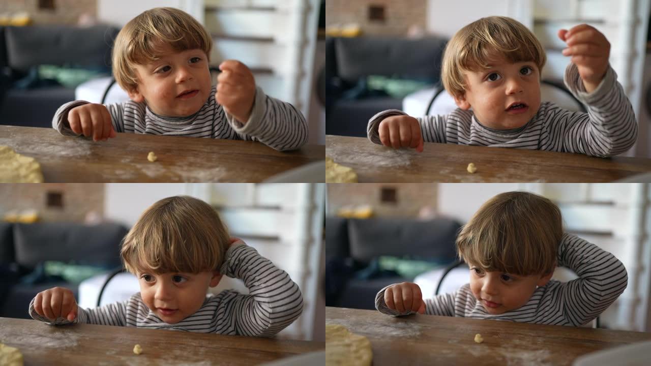 厨房肖像的婴儿蹒跚学步的男孩脸部特写