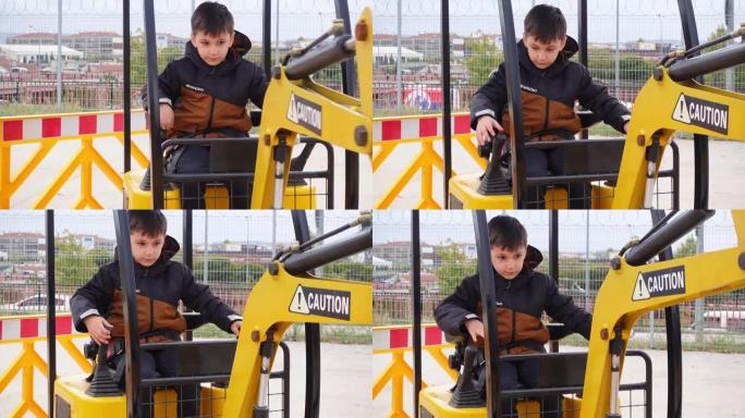 小可爱男孩操作迷你挖掘机