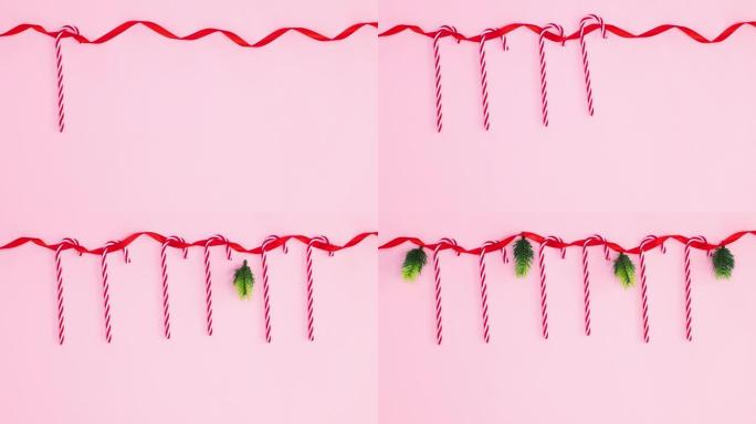 挂在红丝带上的圣诞糖果和松枝。停止运动