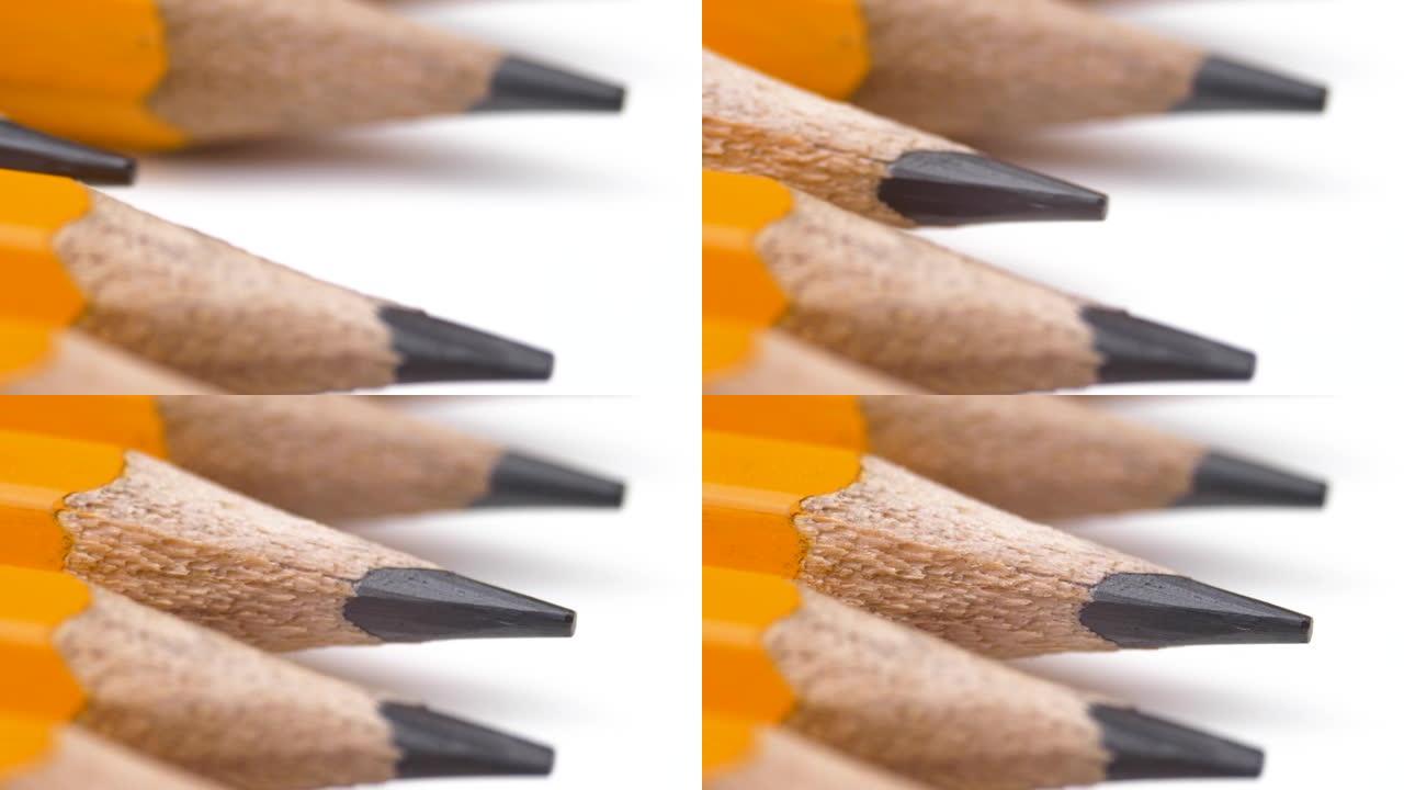 缺少的铅笔回到了锋利铅笔的位置。团队合作和教育理念。夏普铅笔与其他铅笔排成一排，作为共同工作的商业概