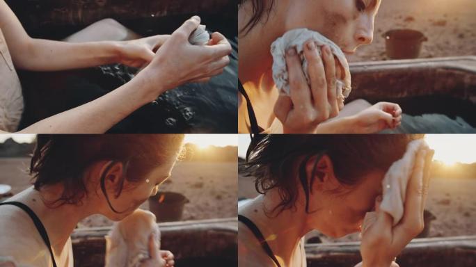 反乌托邦世界的女人在脏浴中清洁皮肤