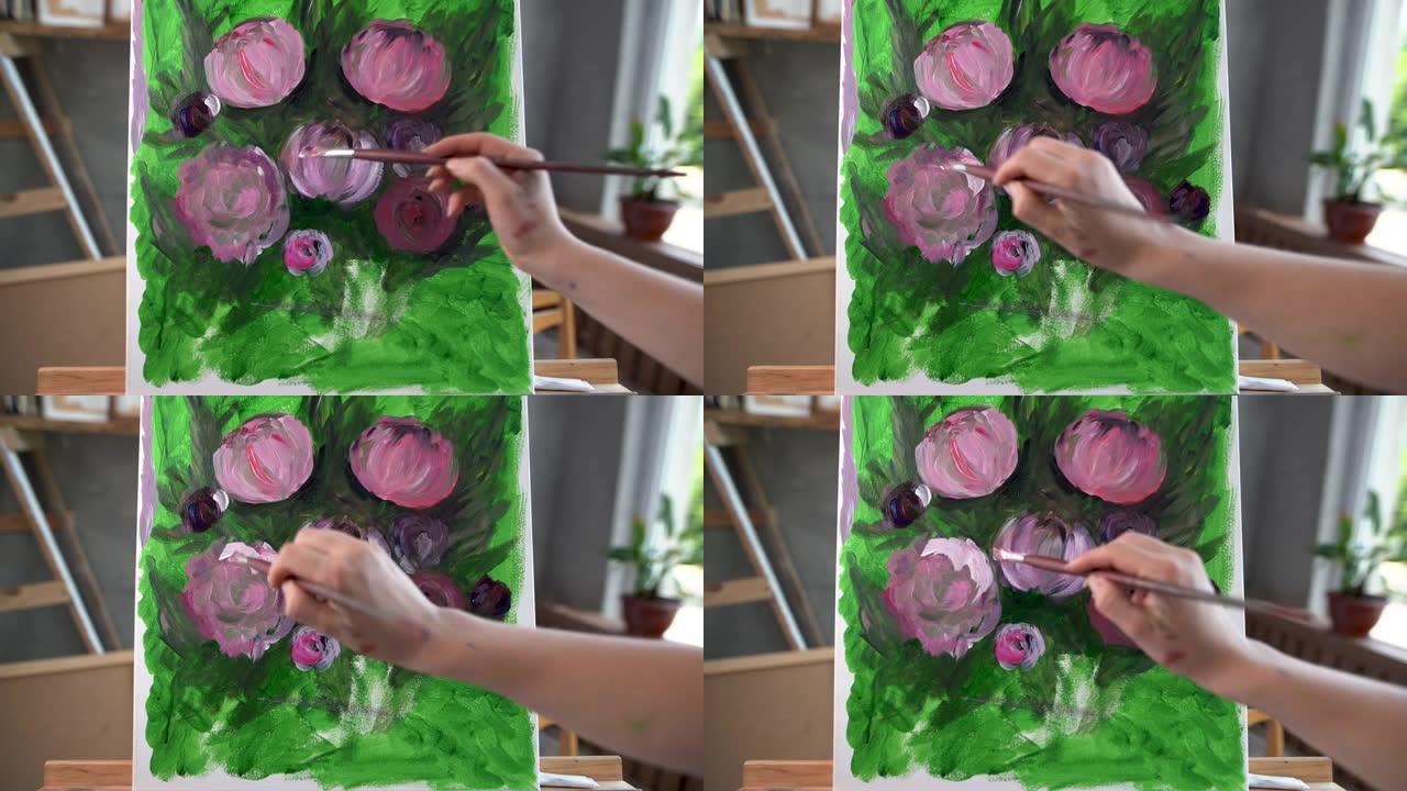 画笔的特写画笔艺术家用丙烯酸颜料画出美丽的花朵牡丹。画布上的创造力画笔爱好艺术工作室