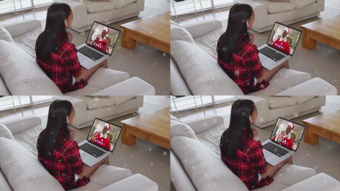 与家人在笔记本电脑视频通话中下雪的快乐白人妇女的动画