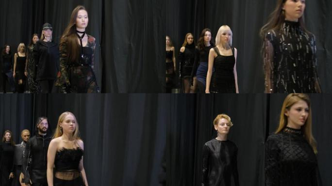 几位女模特在时尚的豪华时尚时装秀上一排排走。