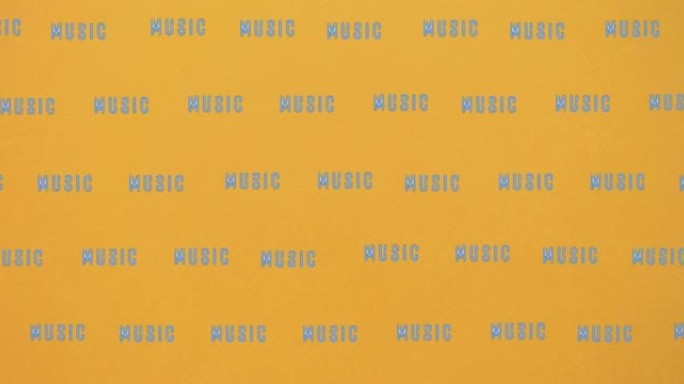 音乐文本在黄色背景上移动的动画