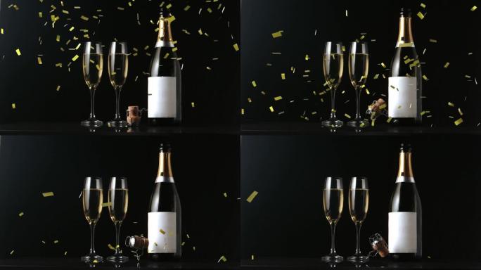 黑色背景上金色五彩纸屑掉落在香槟杯和瓶子上的动画
