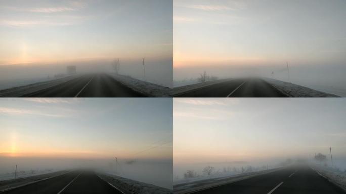 日出时在迷雾路骑汽车，视野不佳
