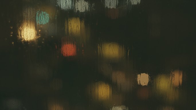 雨夜玻璃水滴光斑空境素材