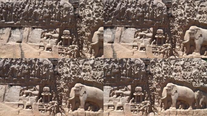 印度泰米尔纳德邦Mahabalipuram的两块巨石上雕刻着巨大的露天岩石浮雕。